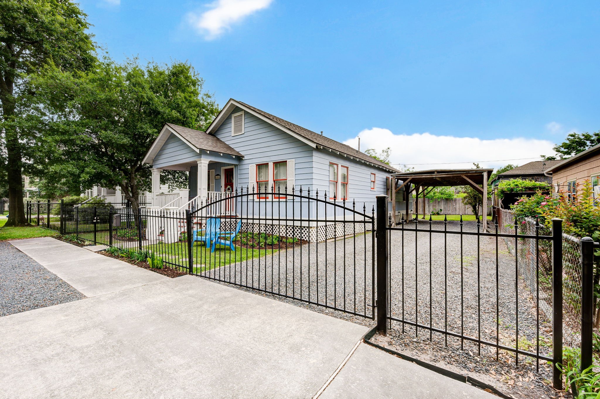 408 Tabor Street Houston, TX 77009 - Photo 3 of 35 a view of a wrought iron fences in front of house