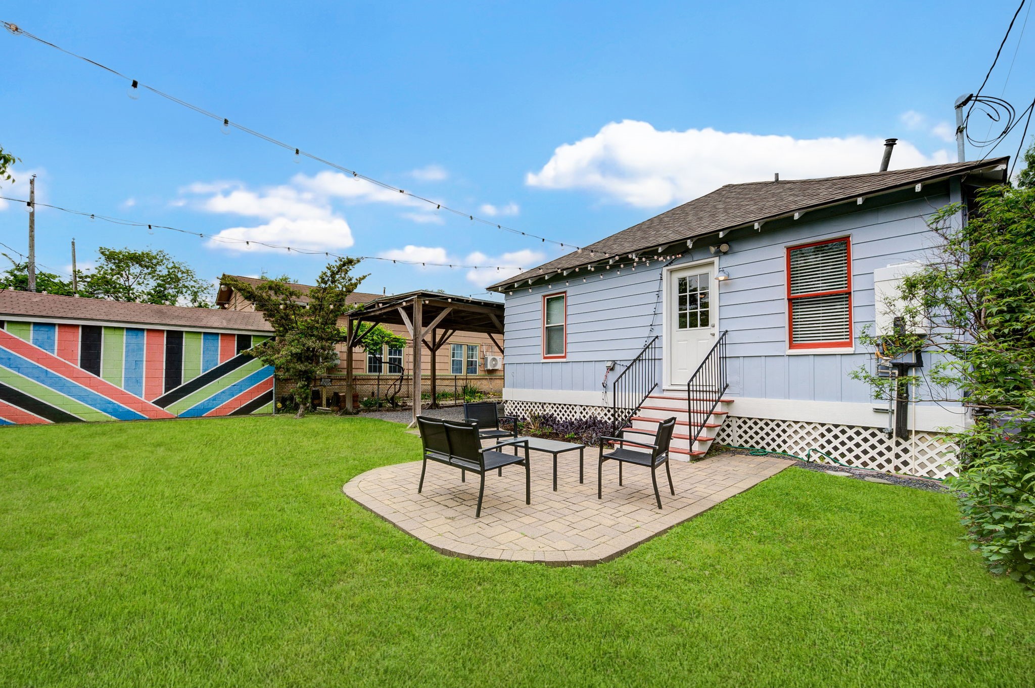 408 Tabor Street Houston, TX 77009 - Photo 32 of 35 a view of a house with a yard patio and sitting area