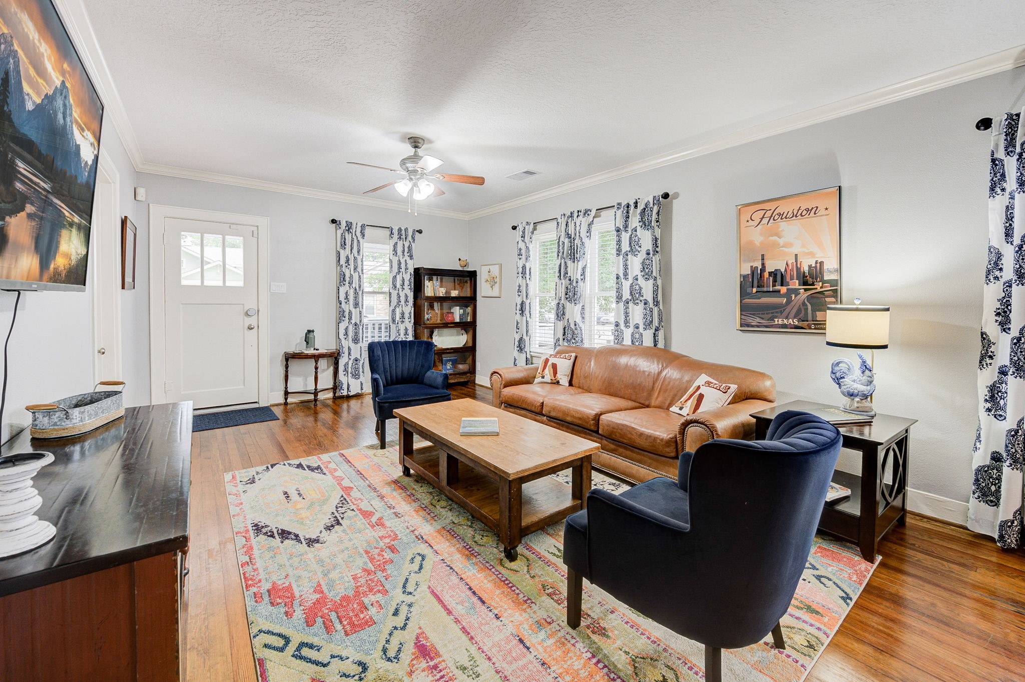 408 Tabor Street Houston, TX 77009 - Photo 8 of 35 a living room with furniture and a wooden floor
