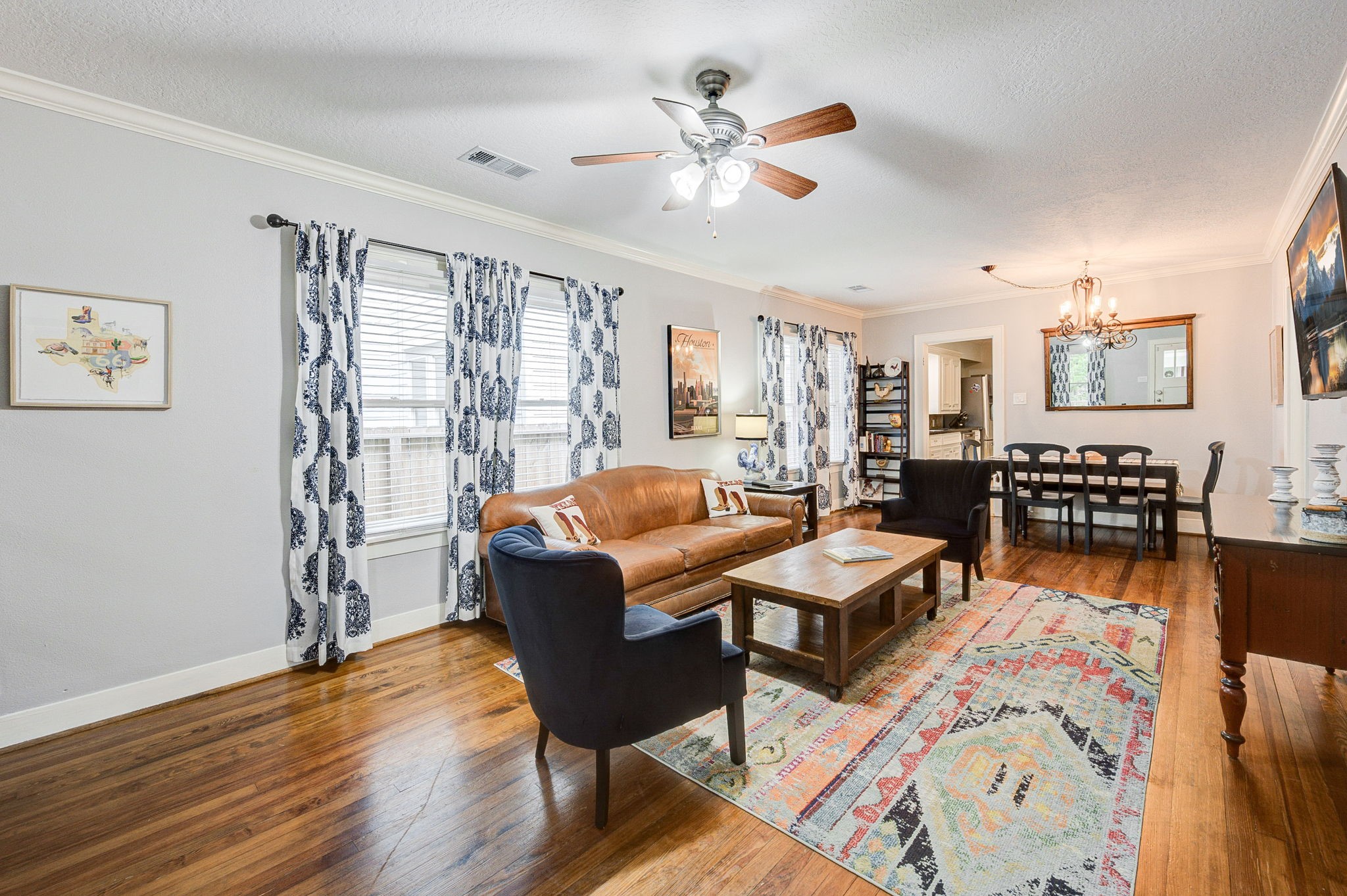 408 Tabor Street Houston, TX 77009 - Photo 9 of 35 a living room with furniture or couch and a bookshelf