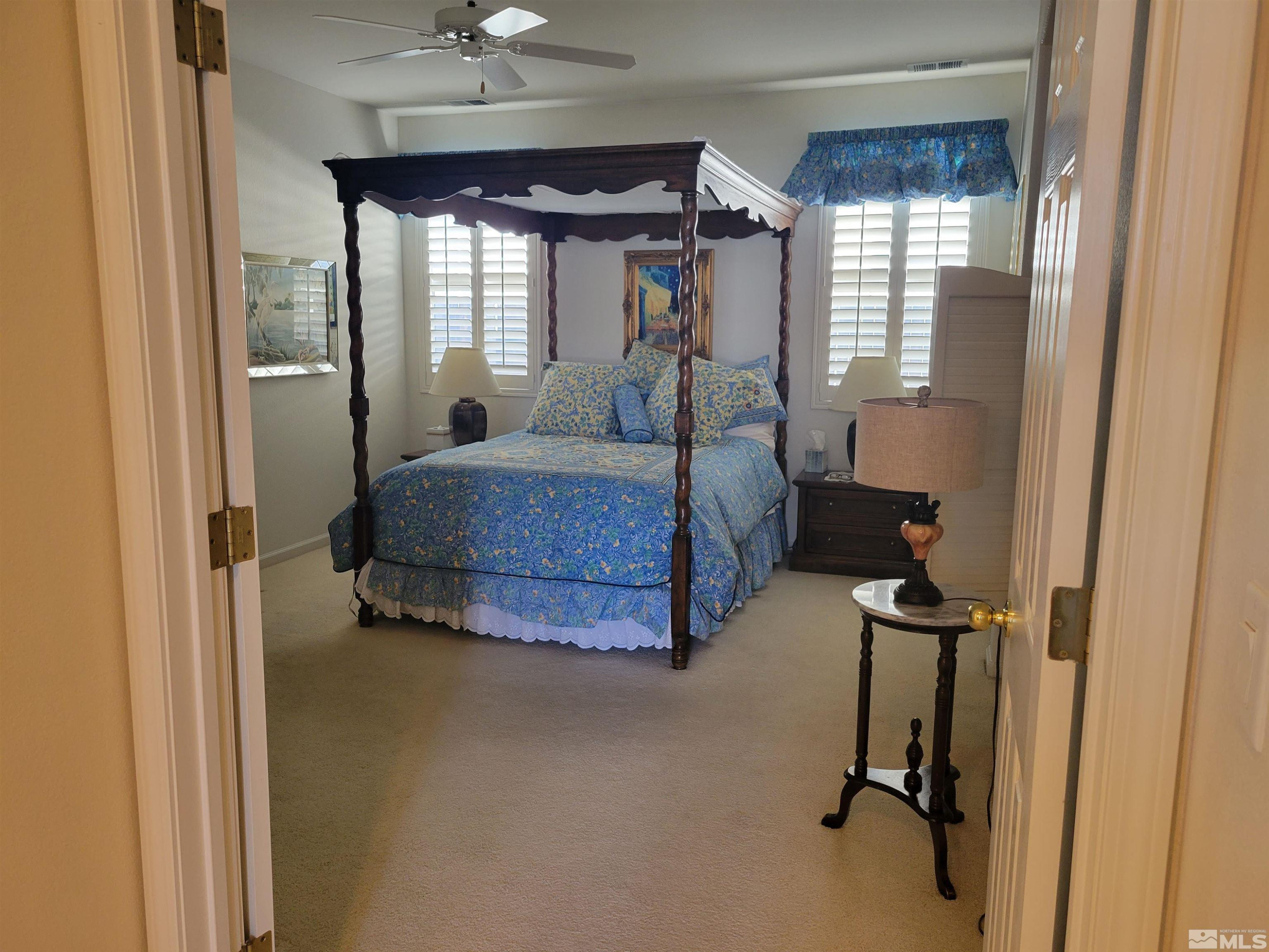 10415 Summershade Lane Reno, NV 89521 - Photo 11 of 15 a room with a bed and a window