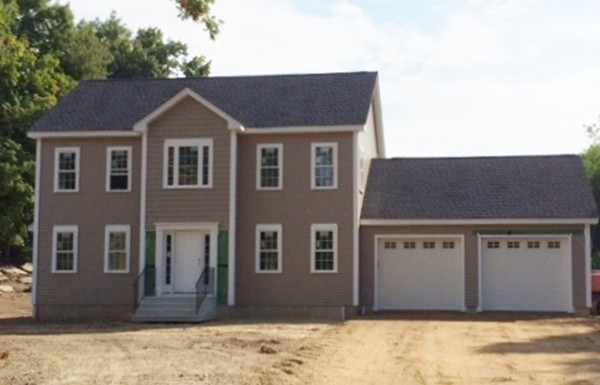 Lot 2 Maple Avenue Rutland, MA 01543 - Photo 2 of 8 a front view of a house with a yard
