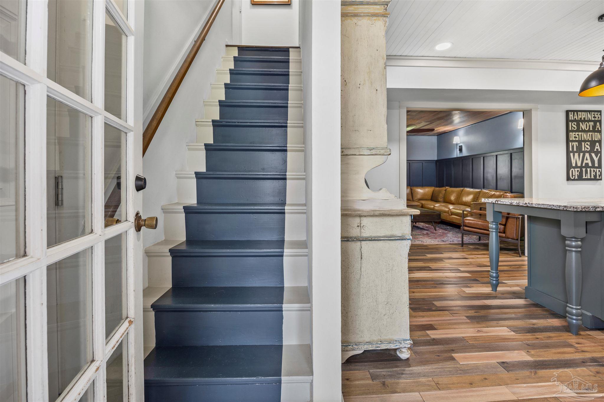 4067 Parkview Street Pace, FL 32571 - Photo 24 of 46 a view of entryway and hall with wooden floor