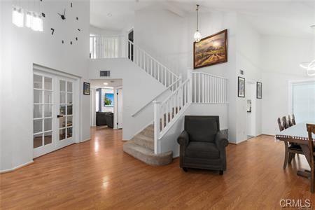 1358 Leopard Court Palmdale, CA 93551 - Photo 5 of 11 a living room with furniture and a wooden floor