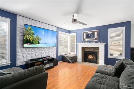 1358 Leopard Court Palmdale, CA 93551 - Photo 6 of 11 a living room with furniture and a fireplace