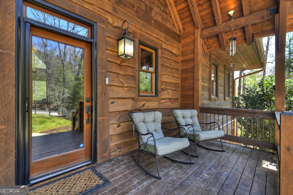 366 Shepherds Lane Morganton, GA 30560 - Photo 15 of 79 a balcony with wooden floor and outdoor seating