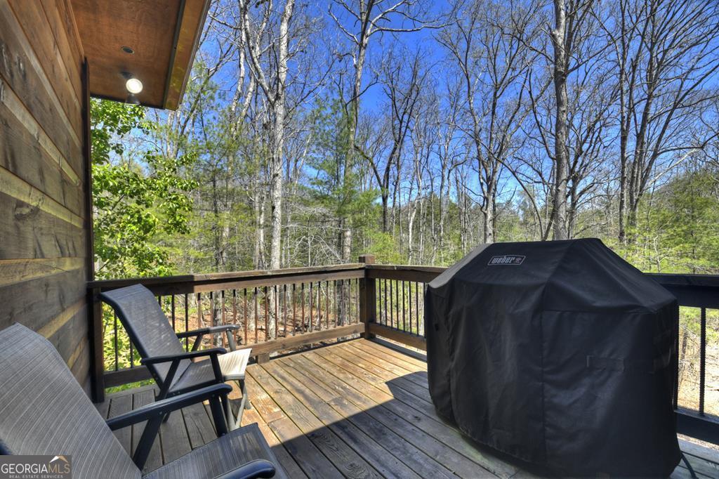 366 Shepherds Lane Morganton, GA 30560 - Photo 20 of 79 a view of balcony with wooden floor and outdoor seating