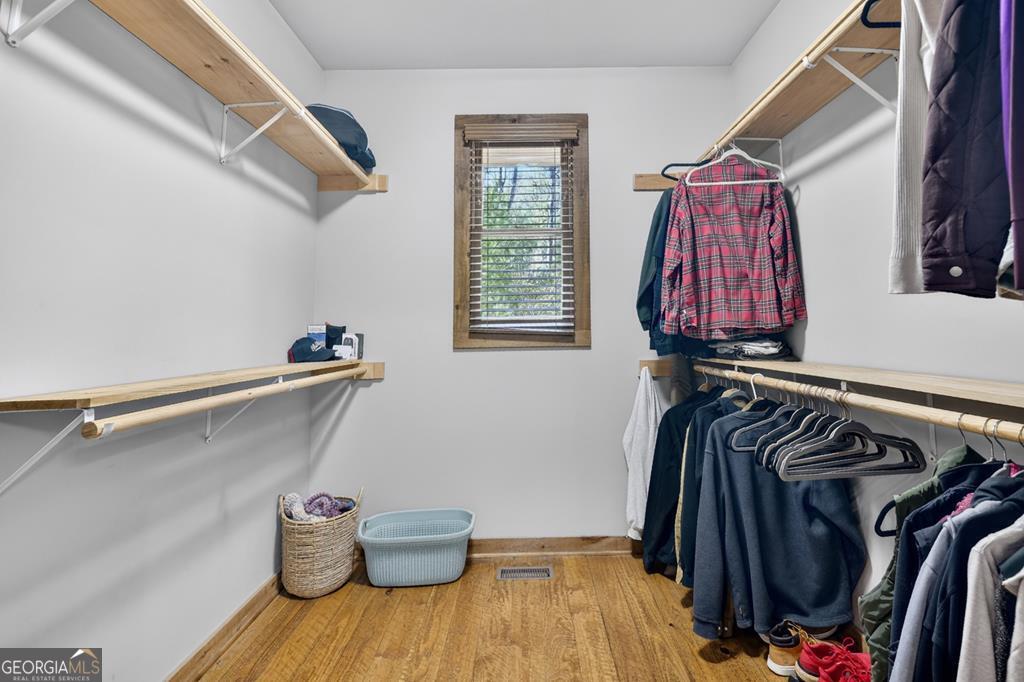 366 Shepherds Lane Morganton, GA 30560 - Photo 43 of 79 a view of walk in closet with clothes and shoes
