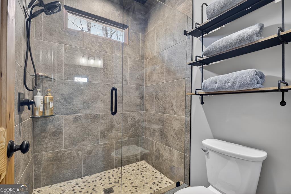 366 Shepherds Lane Morganton, GA 30560 - Photo 56 of 79 a bathroom with a shower