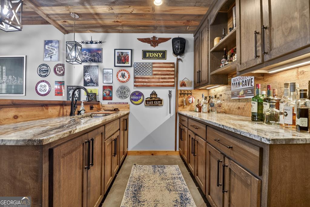 366 Shepherds Lane Morganton, GA 30560 - Photo 57 of 79 a kitchen with stainless steel appliances granite countertop lots of counter top space