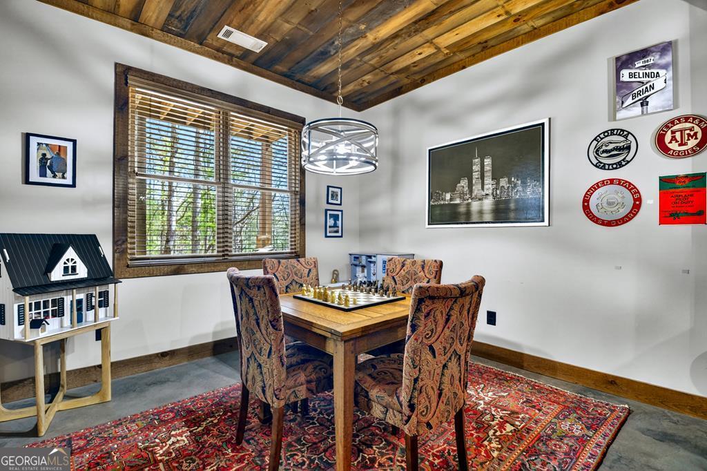 366 Shepherds Lane Morganton, GA 30560 - Photo 62 of 79 a dining room with furniture and window