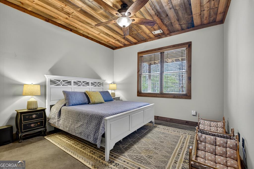 366 Shepherds Lane Morganton, GA 30560 - Photo 64 of 79 a bedroom with a bed and a window