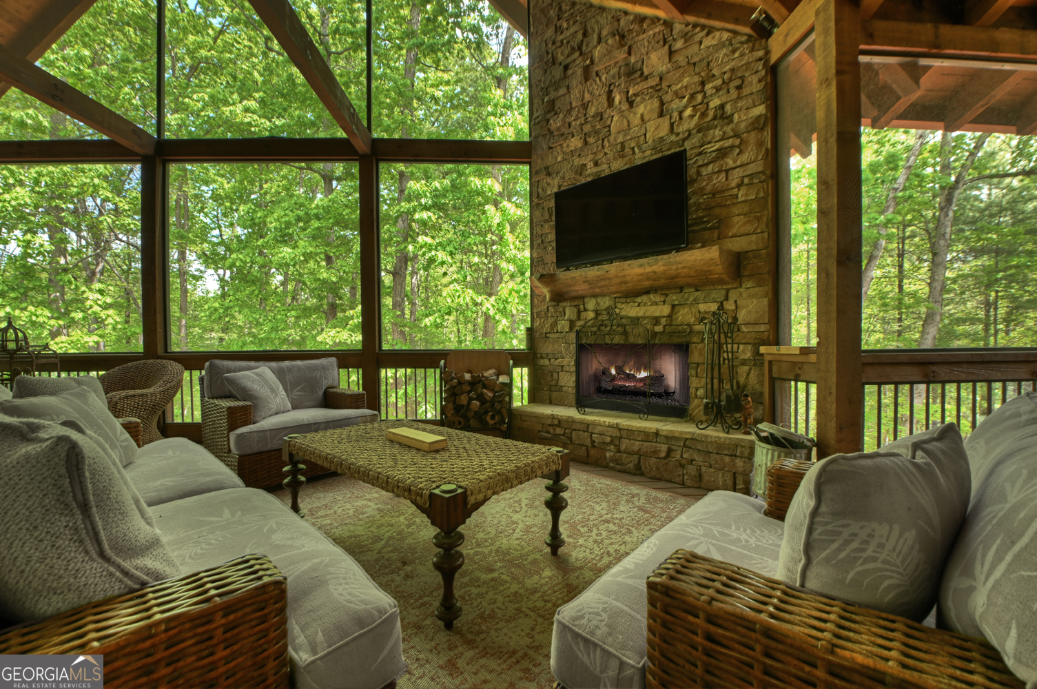 366 Shepherds Lane Morganton, GA 30560 - Photo 69 of 79 a living room with furniture a fireplace and a large window