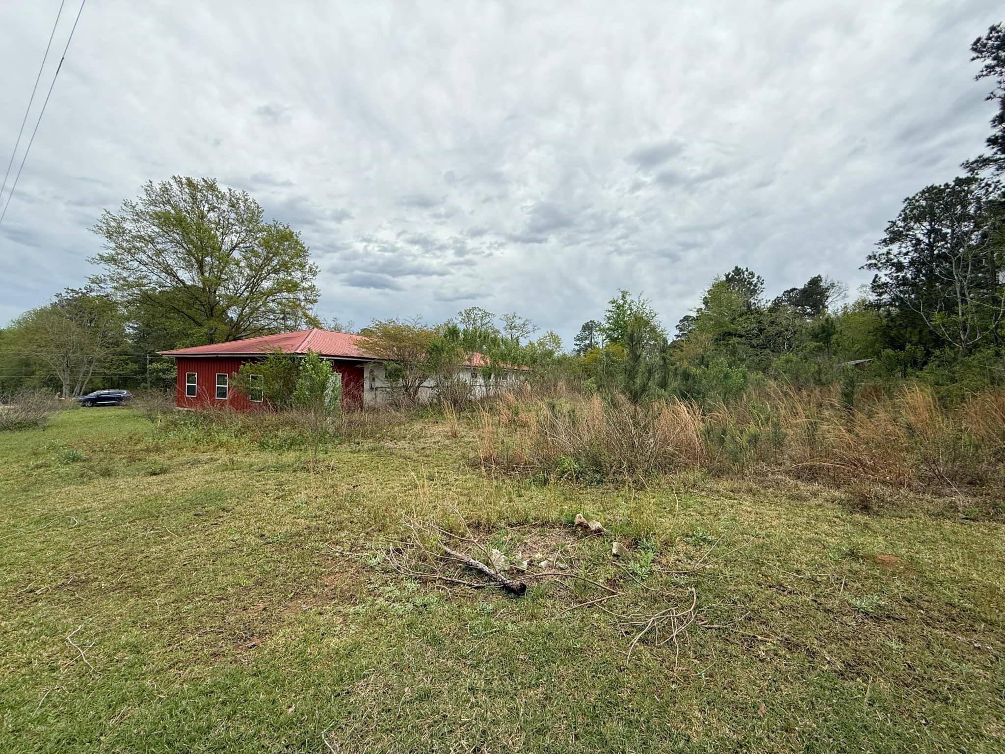 1951 Caton Road Florala, AL 36442 - Photo 3 of 34 a view of a garden with an outdoor space