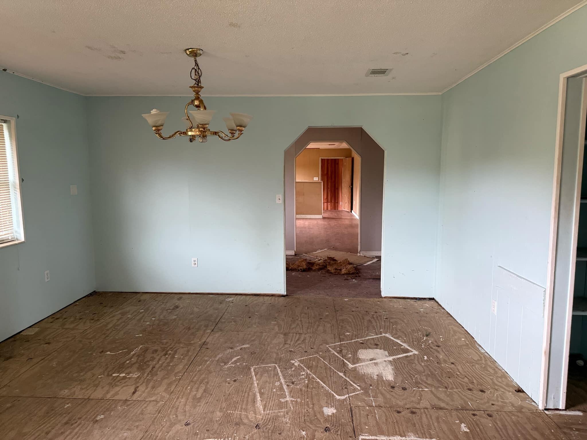 1951 Caton Road Florala, AL 36442 - Photo 8 of 34 a view of a livingroom with a staircase