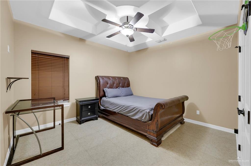 1605 East 30th Street Mission, TX 78574 - Photo 7 of 16 Bedroom featuring light flooring and ceiling fan