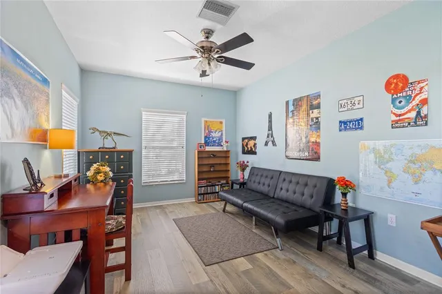 a living room with furniture and window