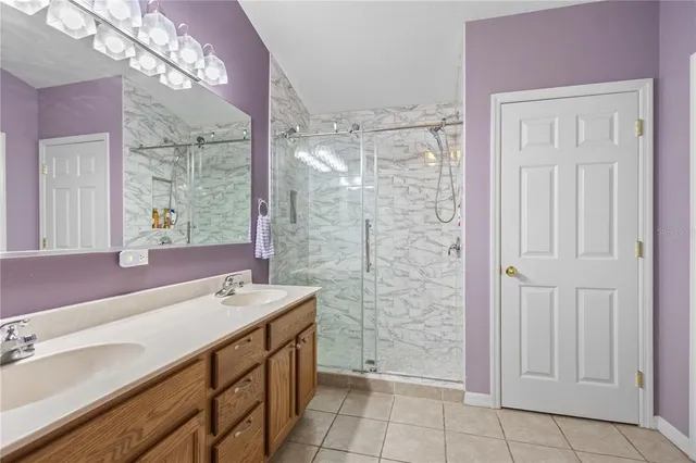 a bathroom with a sink a vanity and a mirror