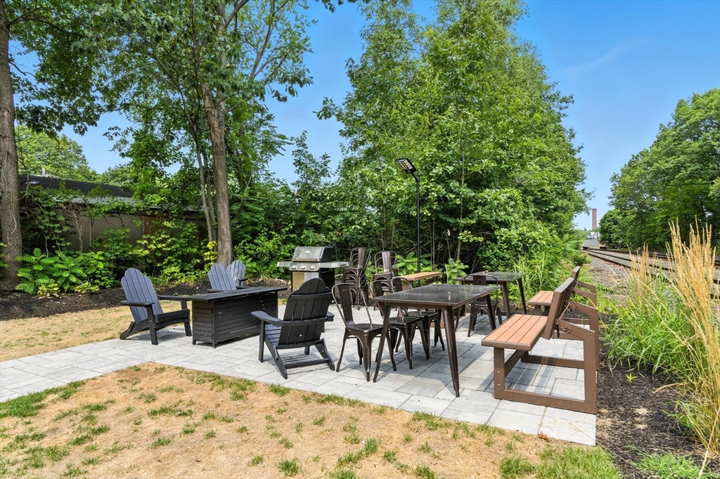 55 Sterling Street, Unit 306 Clinton, MA 01510 - Photo 28 of 32 an outdoor space with furniture for seating