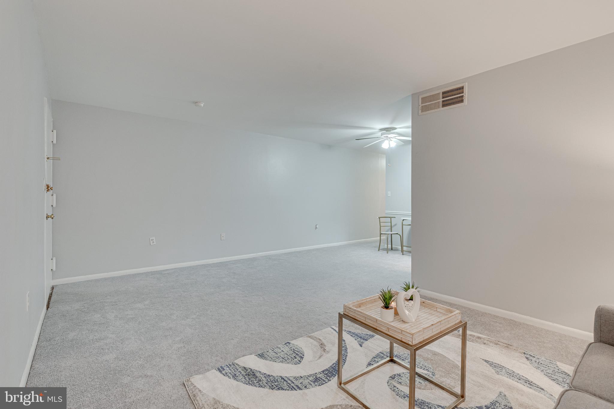 9473 Fairfax Boulevard, Unit 104 Fairfax, VA 22031 - Photo 6 of 32 a bathroom with a sink and a mirror