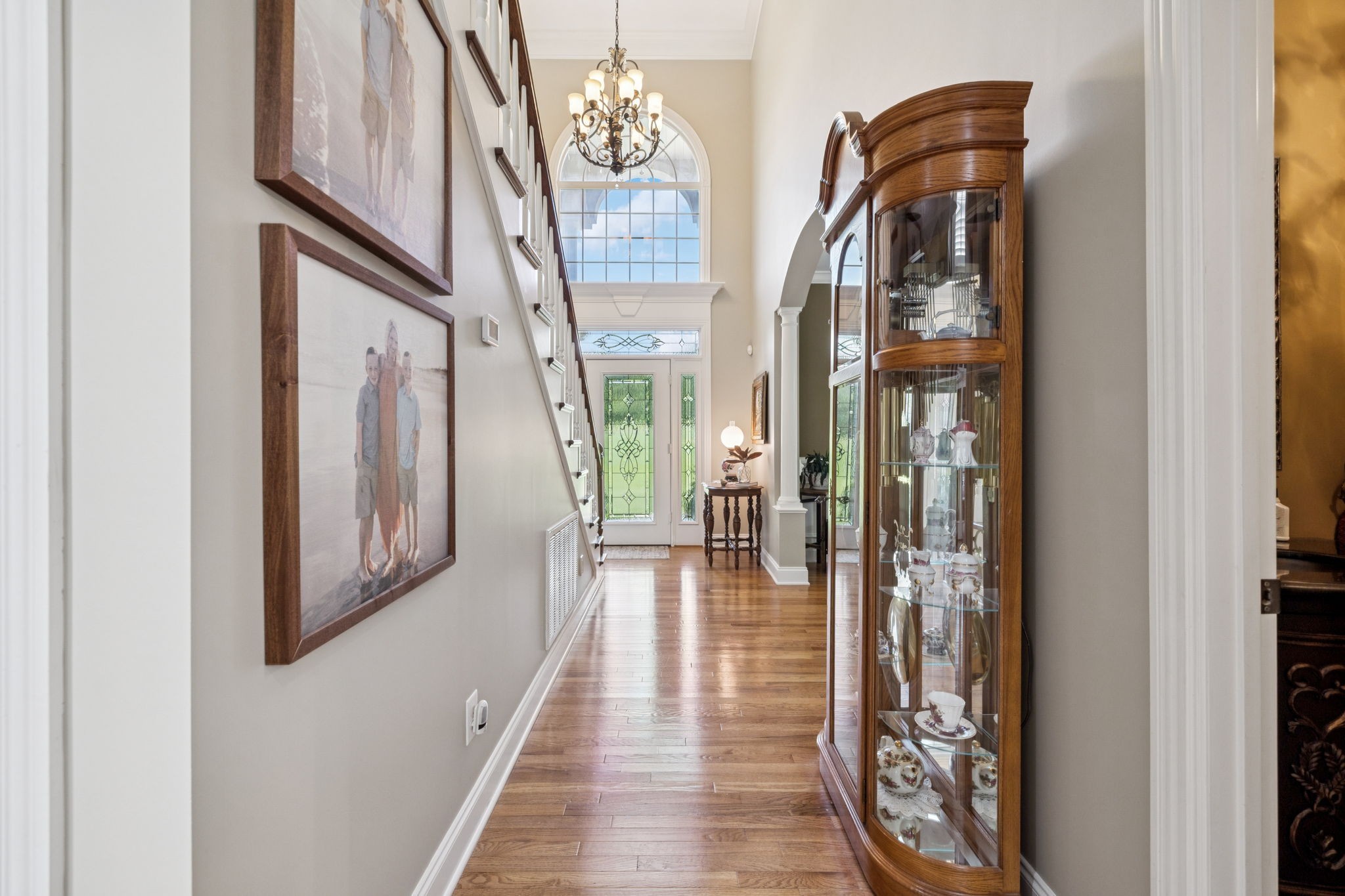 3056 Southeast Tater Peeler Road Lebanon, TN 37090 - Photo 21 of 100 a view of a hallway with wooden floor and staircase
