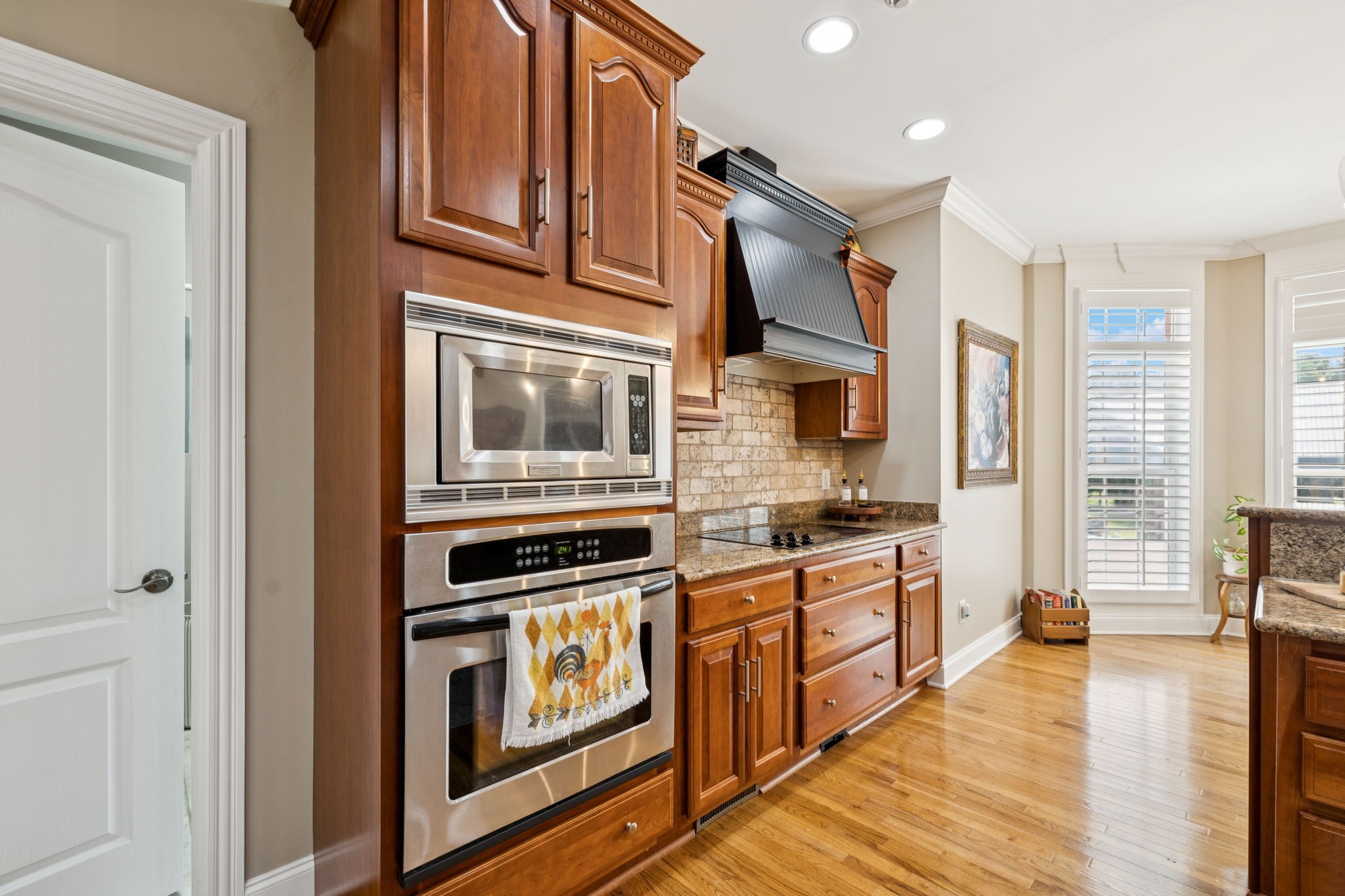 3056 Southeast Tater Peeler Road Lebanon, TN 37090 - Photo 37 of 100 a kitchen with stainless steel appliances granite countertop a stove and a refrigerator