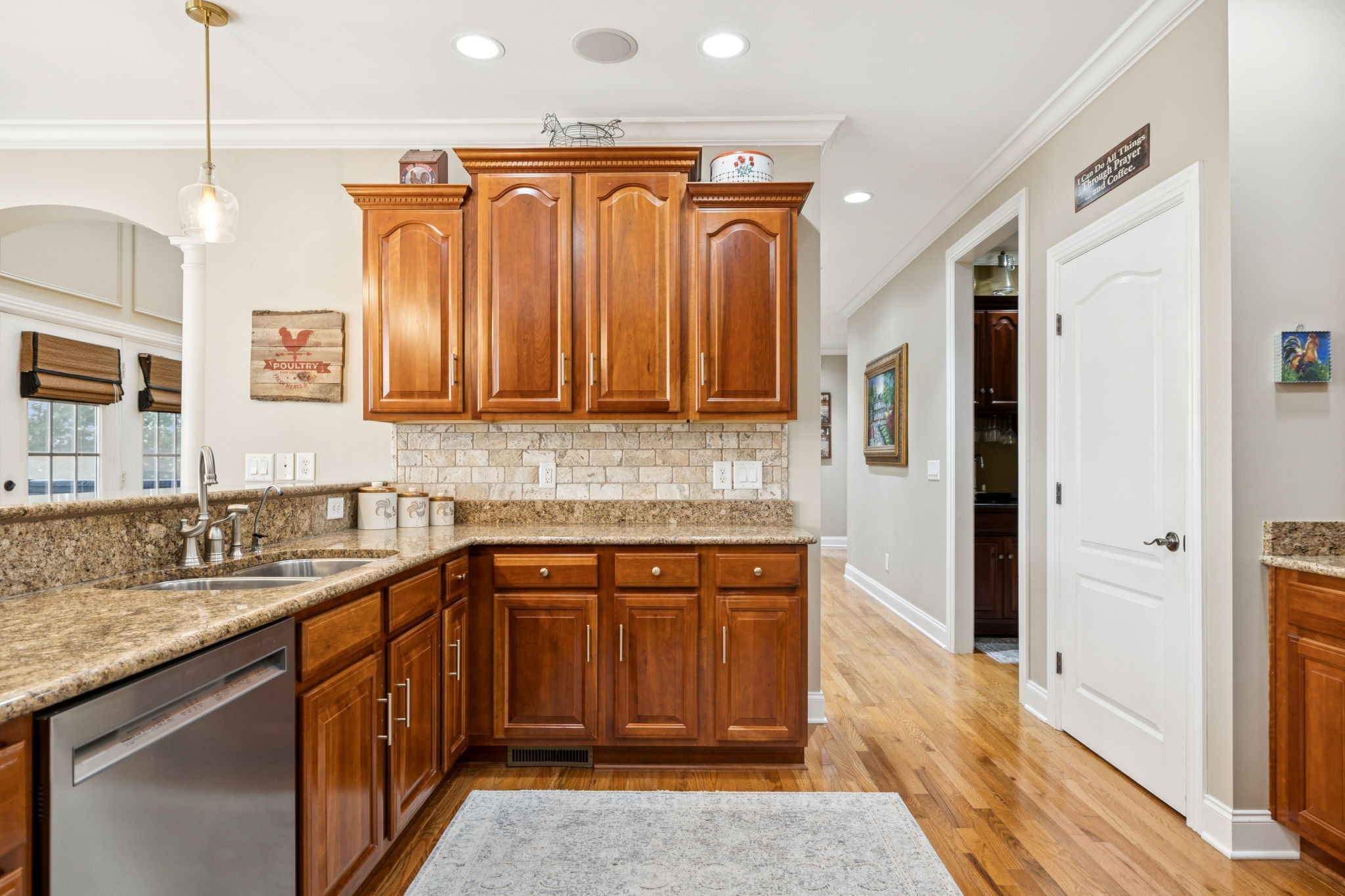 3056 Southeast Tater Peeler Road Lebanon, TN 37090 - Photo 39 of 100 a kitchen with stainless steel appliances granite countertop a sink stove and refrigerator