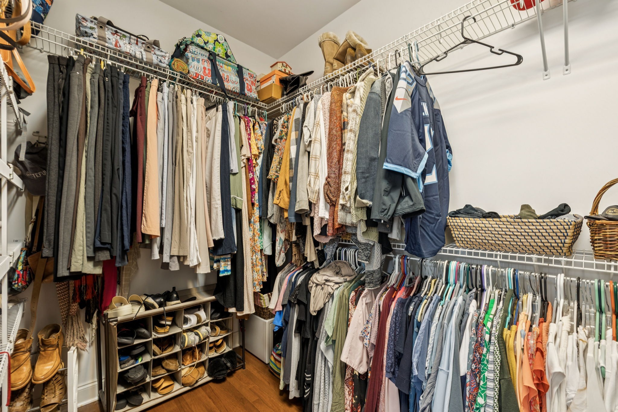 3056 Southeast Tater Peeler Road Lebanon, TN 37090 - Photo 55 of 100 a view of walk in closet with clothes and shoes