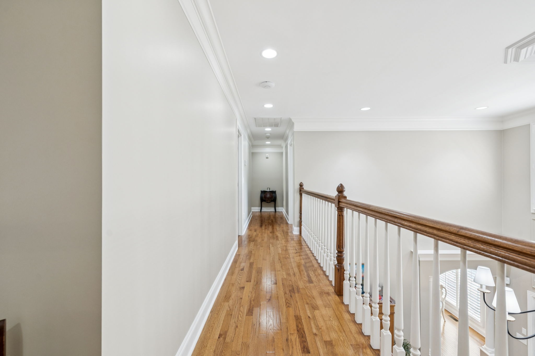 3056 Southeast Tater Peeler Road Lebanon, TN 37090 - Photo 62 of 100 a view of a hallway with wooden floor and staircase