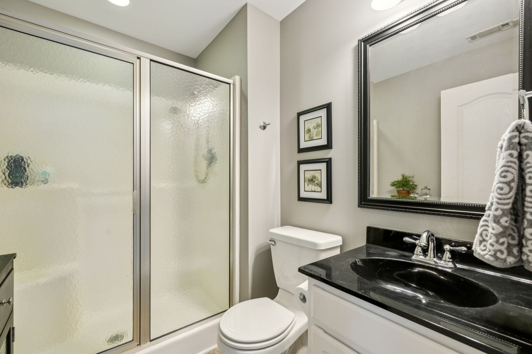 3056 Southeast Tater Peeler Road Lebanon, TN 37090 - Photo 71 of 100 a bathroom with a sink a toilet and shower