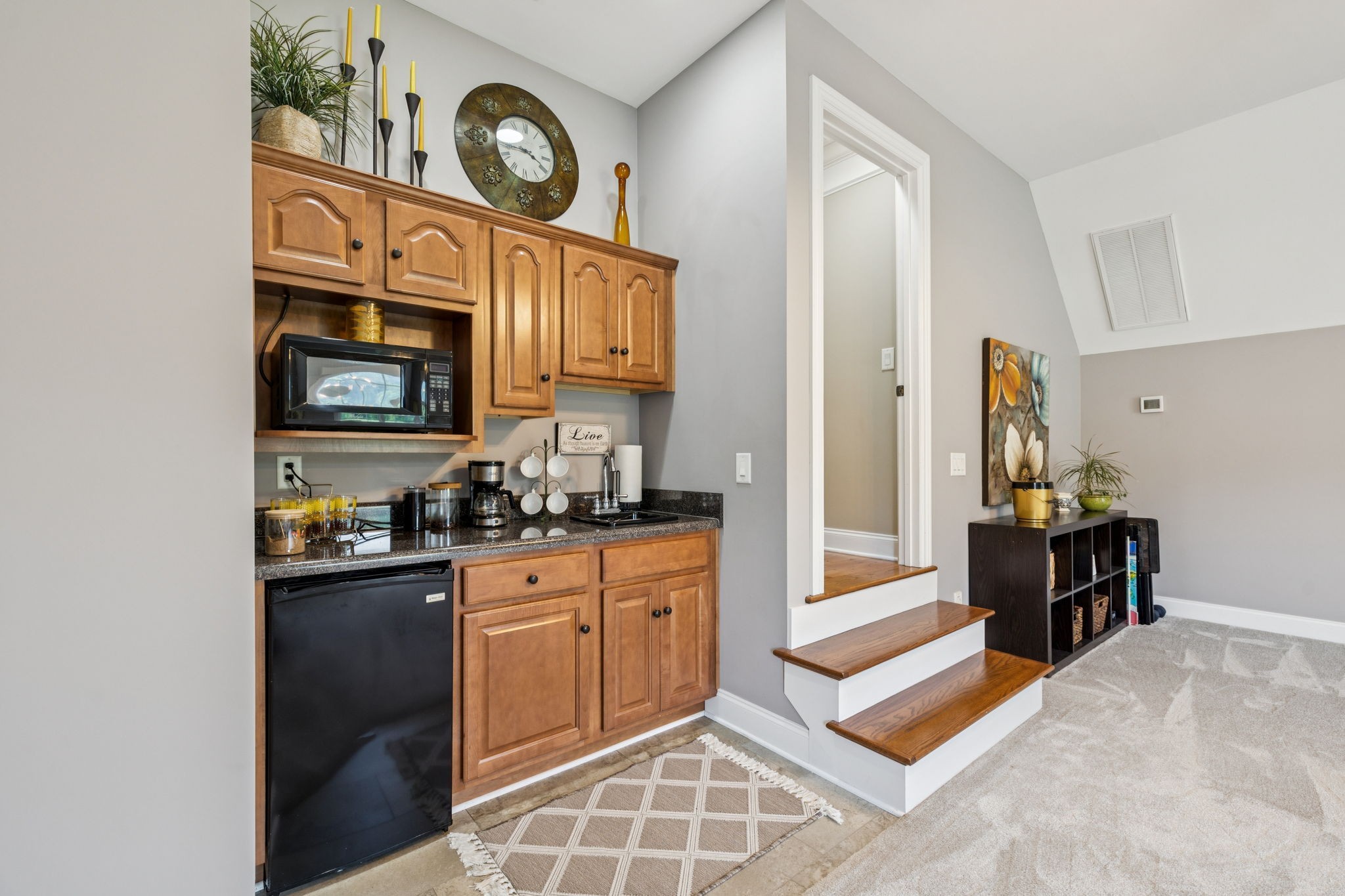 3056 Southeast Tater Peeler Road Lebanon, TN 37090 - Photo 75 of 100 a kitchen with stainless steel appliances granite countertop a stove a sink and a microwave