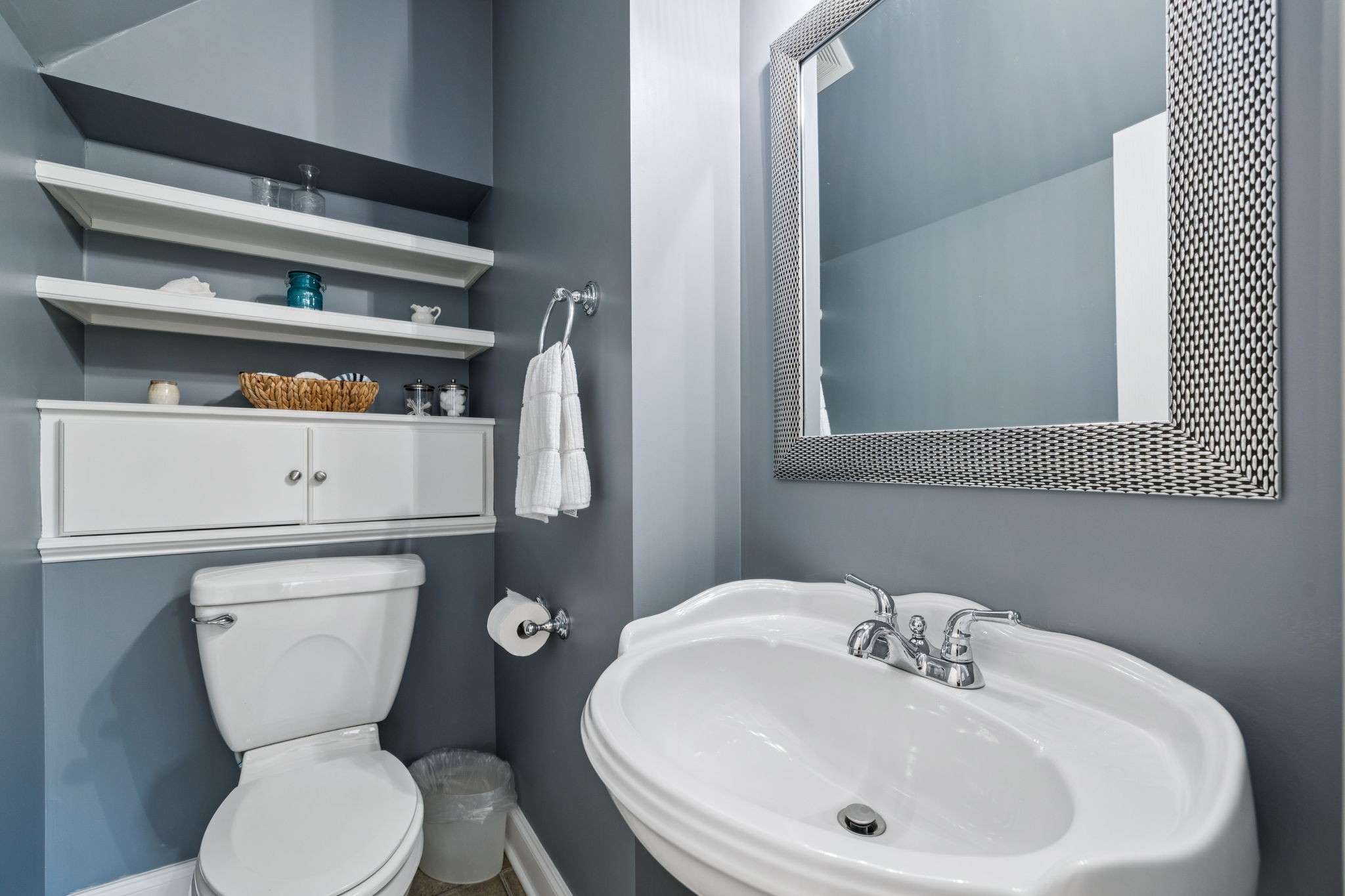 3056 Southeast Tater Peeler Road Lebanon, TN 37090 - Photo 77 of 100 a bathroom with a toilet and a sink