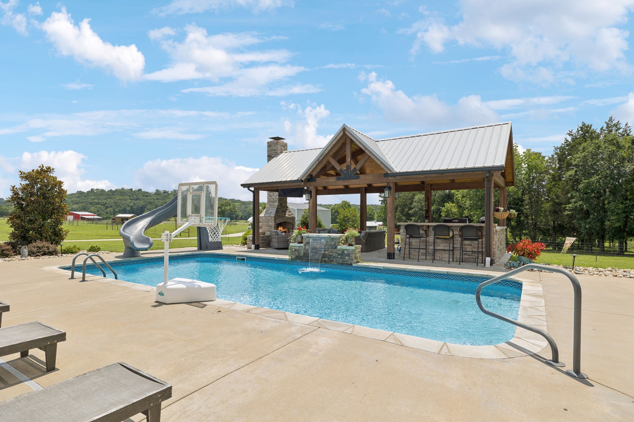 3056 Southeast Tater Peeler Road Lebanon, TN 37090 - Photo 83 of 100 a view of a house with swimming pool and sitting area