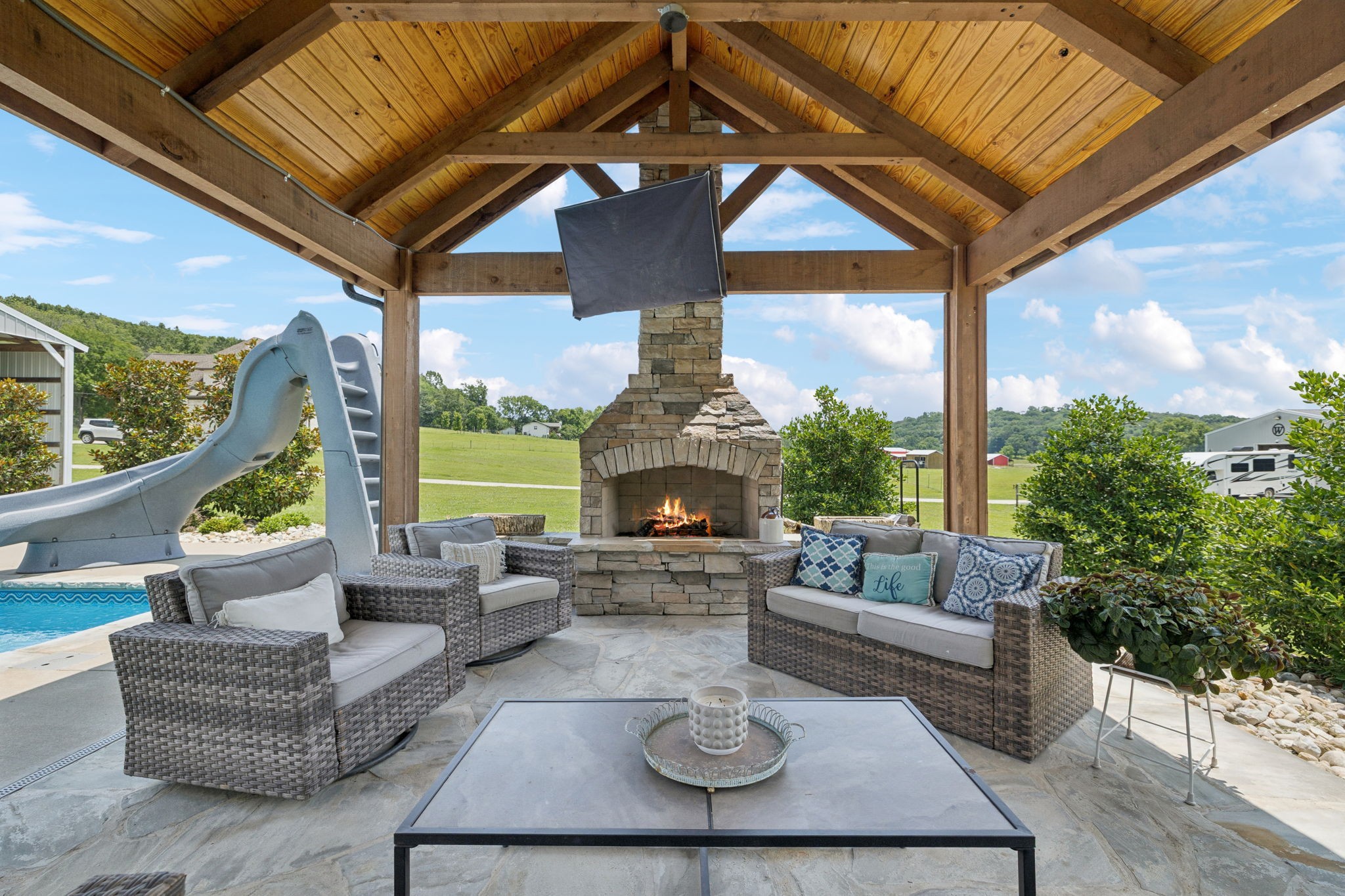 3056 Southeast Tater Peeler Road Lebanon, TN 37090 - Photo 86 of 100 a living room with furniture a fireplace and a large window