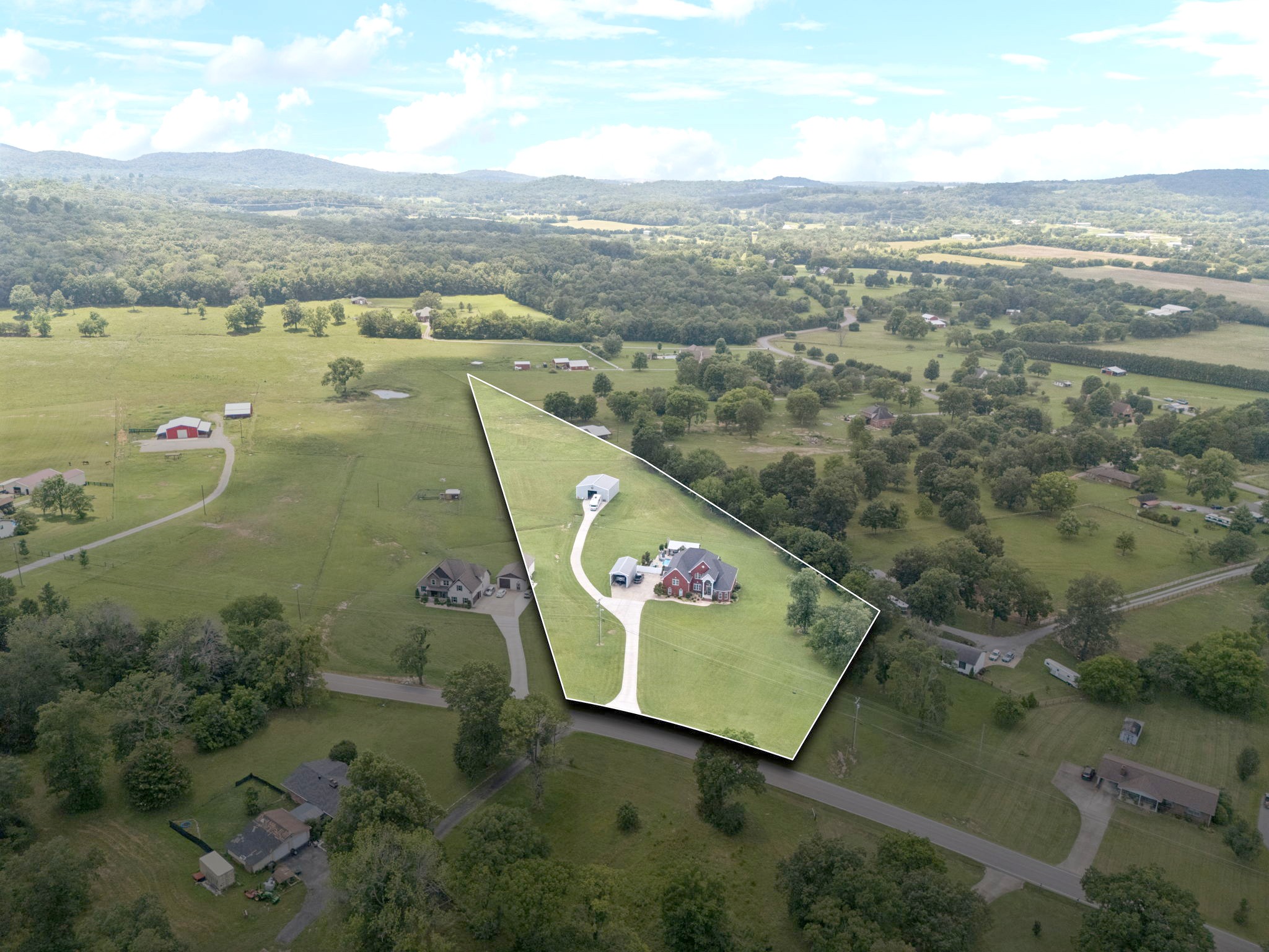 3056 Southeast Tater Peeler Road Lebanon, TN 37090 - Photo 98 of 100 an aerial view of a house with a lake view