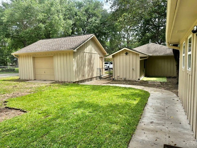 30507 Quinn Road Tomball, TX 77375 - Photo 31 of 33 View of back of the drive through garage to back yard