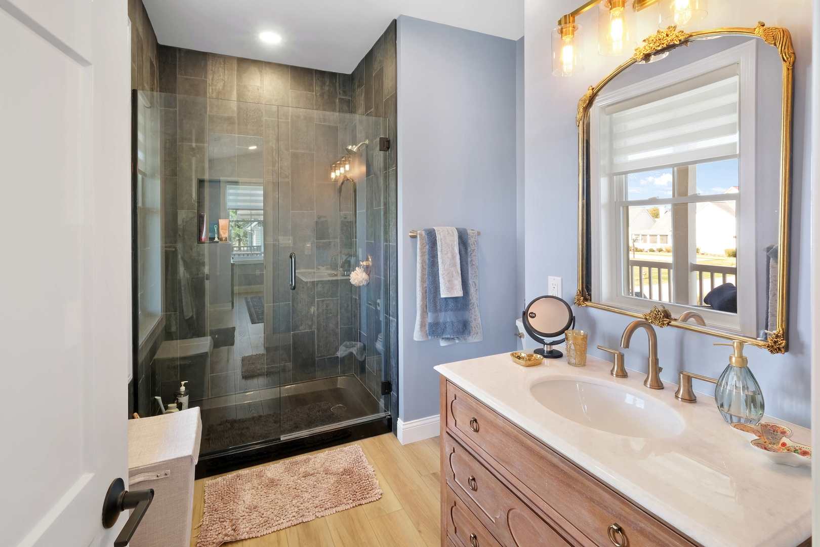 11 Great Loop West Ottawa, IL 61350 - Photo 18 of 22 a bathroom with a sink shower and a mirror