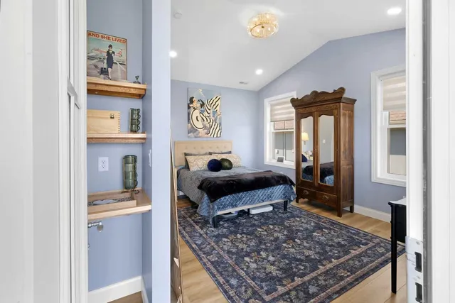 a living room with furniture and a rug