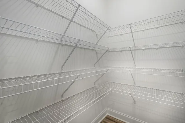 a view of a room with racks on the wall