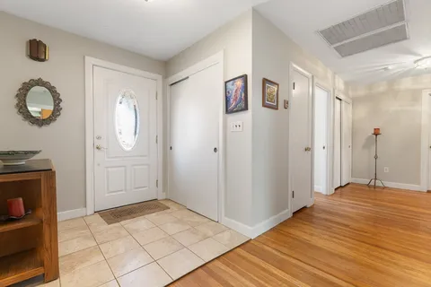 a view of a livingroom with wooden floor