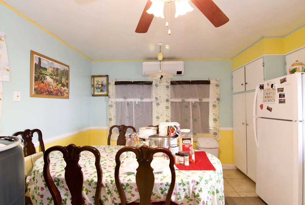 156 Allen Street Springfield, MA 01108 - Photo 15 of 31 a view of a kitchen and dining room