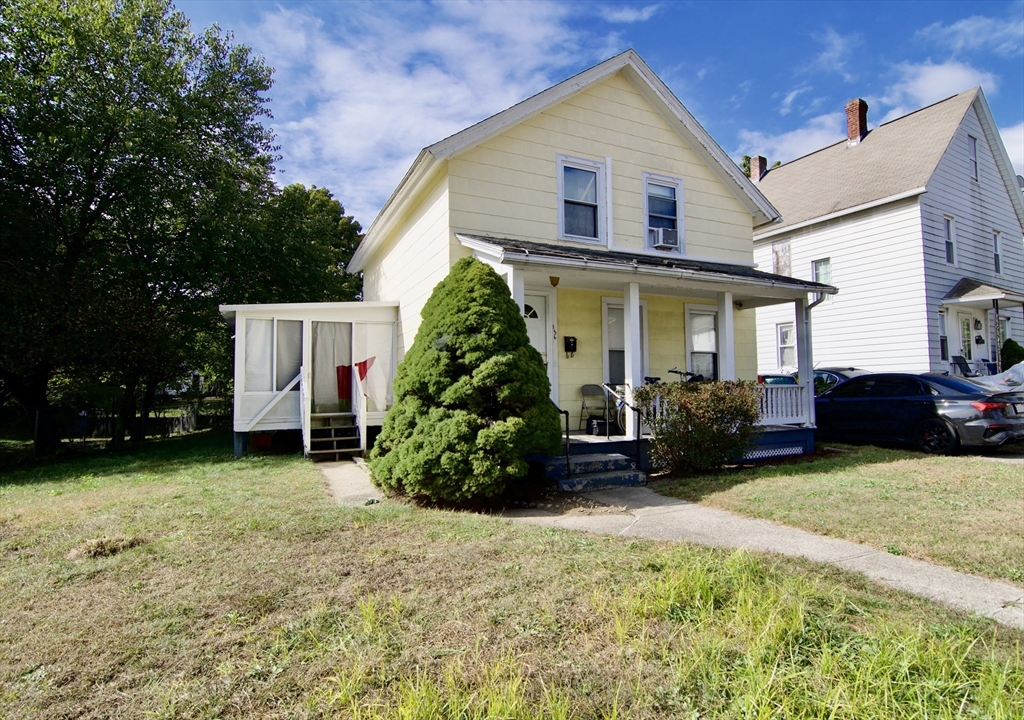 156 Allen Street Springfield, MA 01108 - Photo 2 of 31 a view of a house with backyard and garden