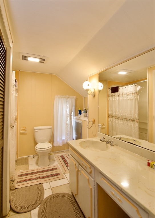 156 Allen Street Springfield, MA 01108 - Photo 25 of 31 a spacious bathroom with a sink and a large mirror