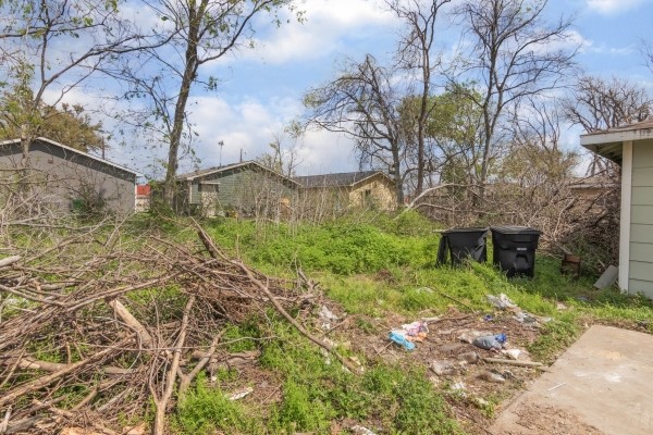7973 Ritz Street Houston, TX 77028 - Photo 20 of 21 a backyard of a house with lots of green space