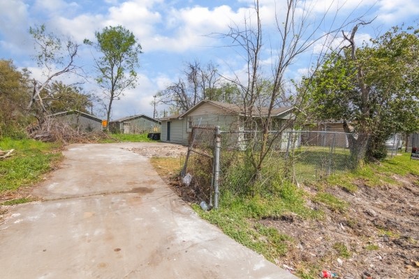 7973 Ritz Street Houston, TX 77028 - Photo 21 of 21 a view of a yard in front of a house