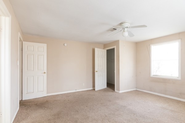 7973 Ritz Street Houston, TX 77028 - Photo 7 of 21 a view of a livingroom with a ceiling fan and window