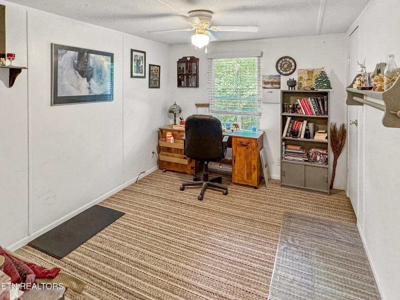 160 Casey Road Harriman, TN 37748 - Photo 17 of 30 a view of a workspace with furniture and a window