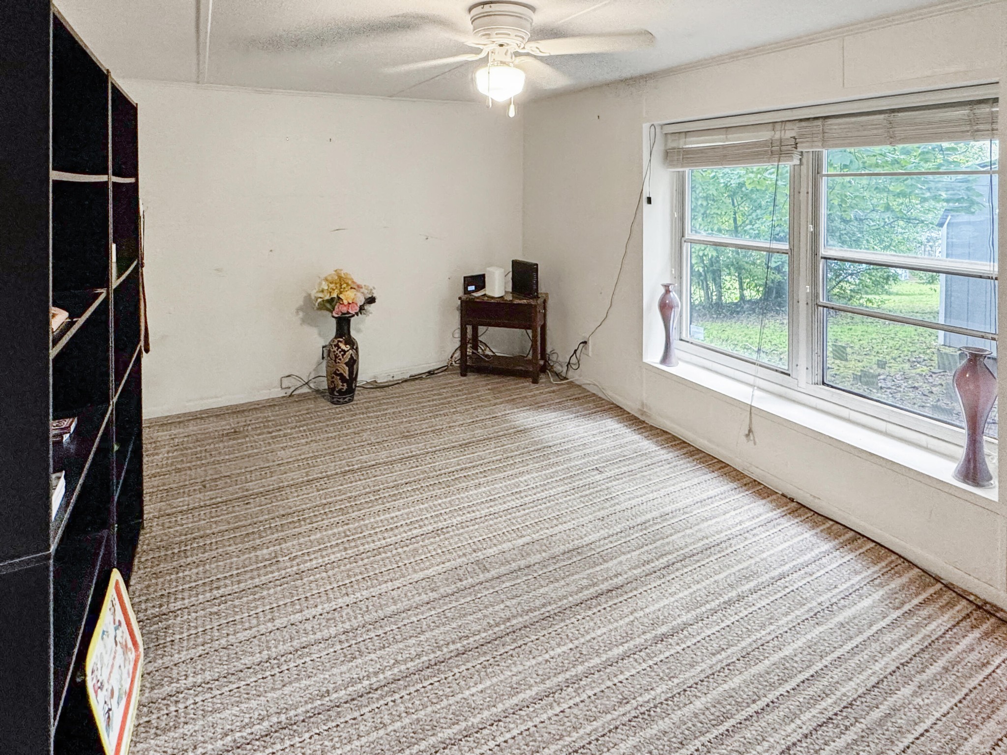 160 Casey Road Harriman, TN 37748 - Photo 19 of 30 a view of a room with wooden floor and fan