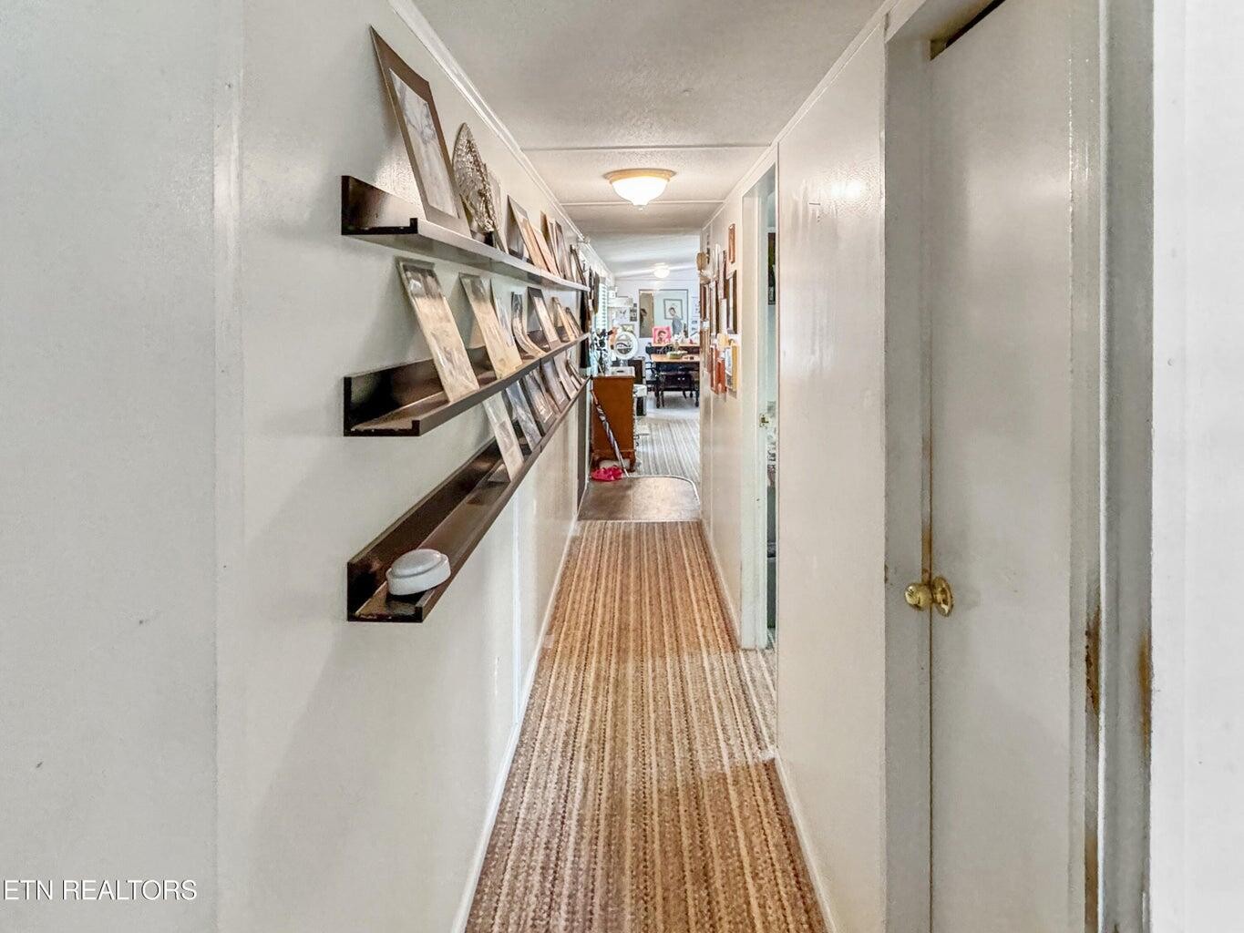 160 Casey Road Harriman, TN 37748 - Photo 20 of 30 a view of a hallway with wooden floor and stairs