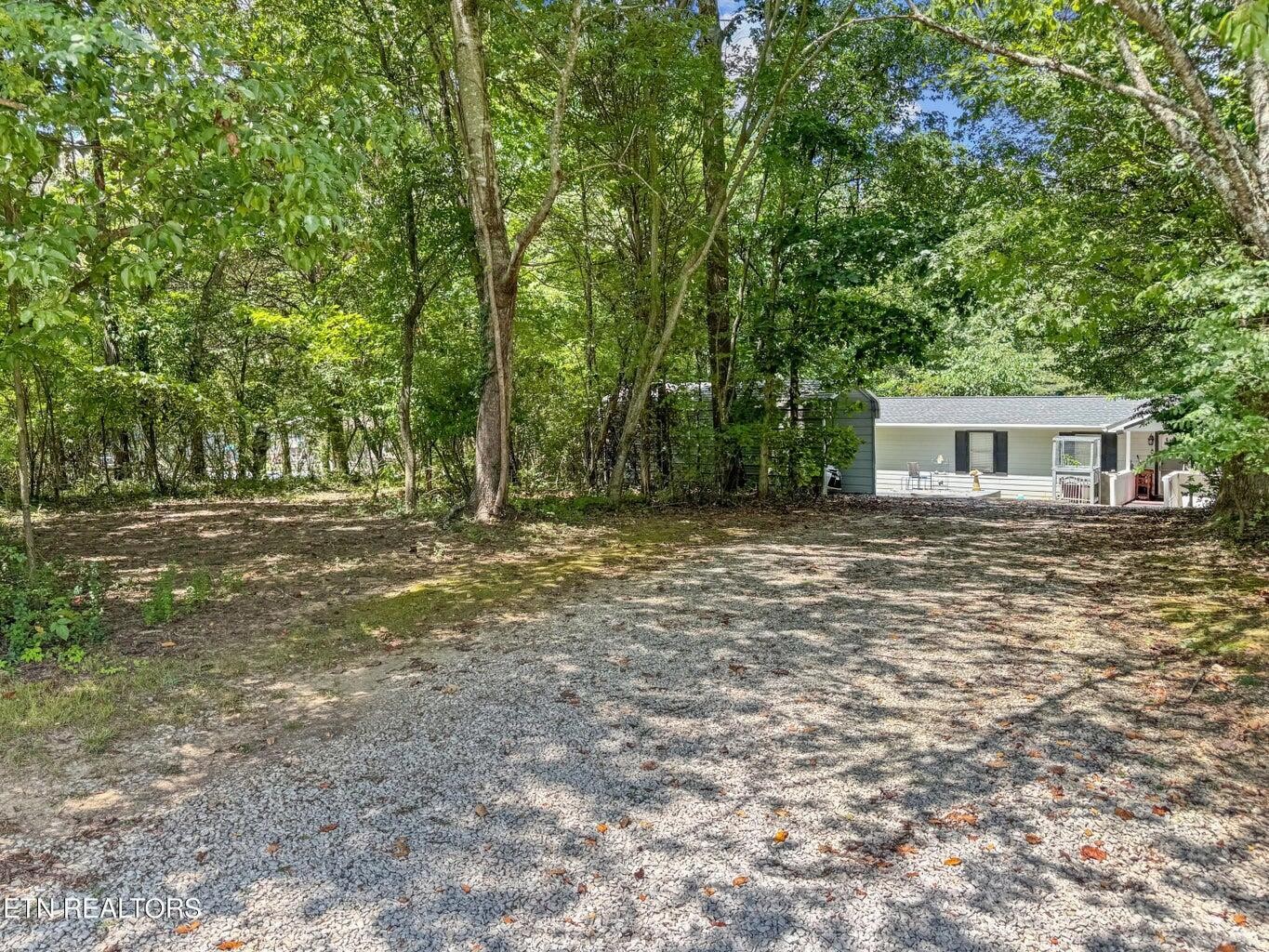 160 Casey Road Harriman, TN 37748 - Photo 21 of 30 a backyard of a house with lots of green space